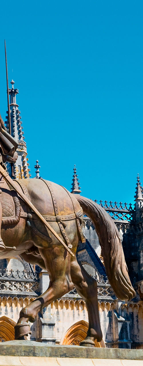 Equestrian statue near Gothic cathedral facade