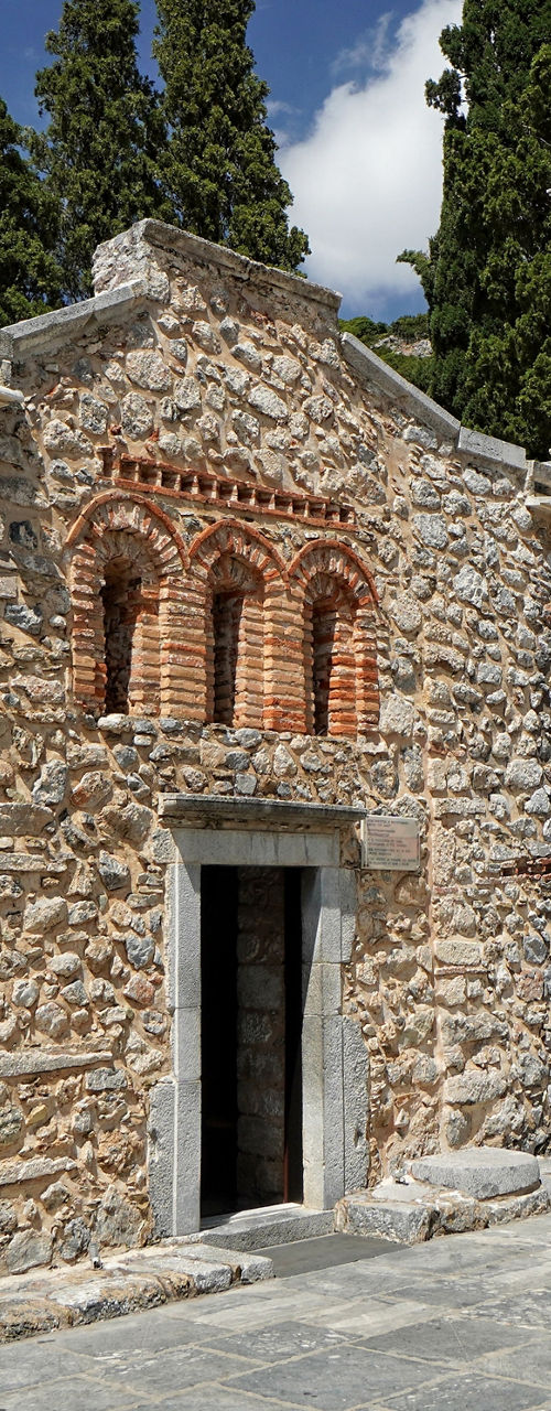 Historic stone church with bell tower