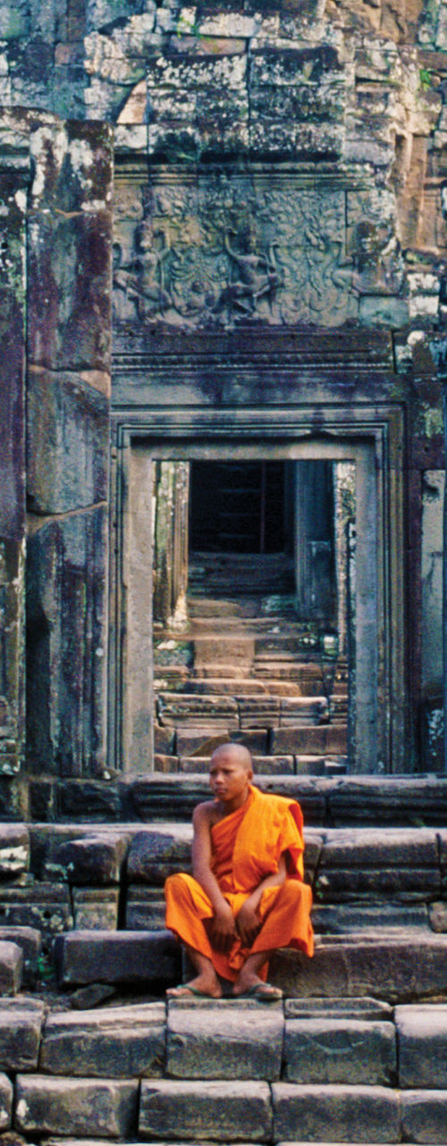 Monks at ancient Angkor Wat temple