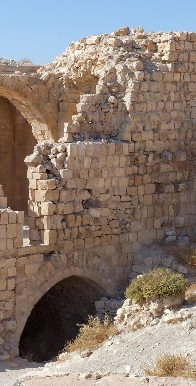 Ancient stone ruins in desert landscape