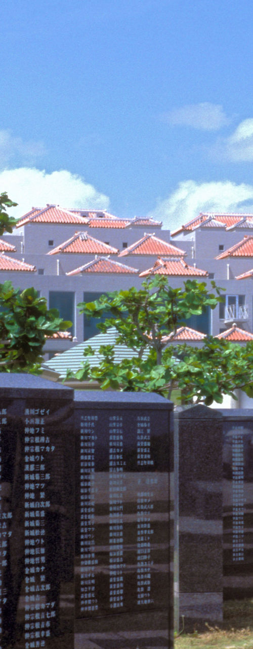 Memorial plaques with scenic building backdrop
