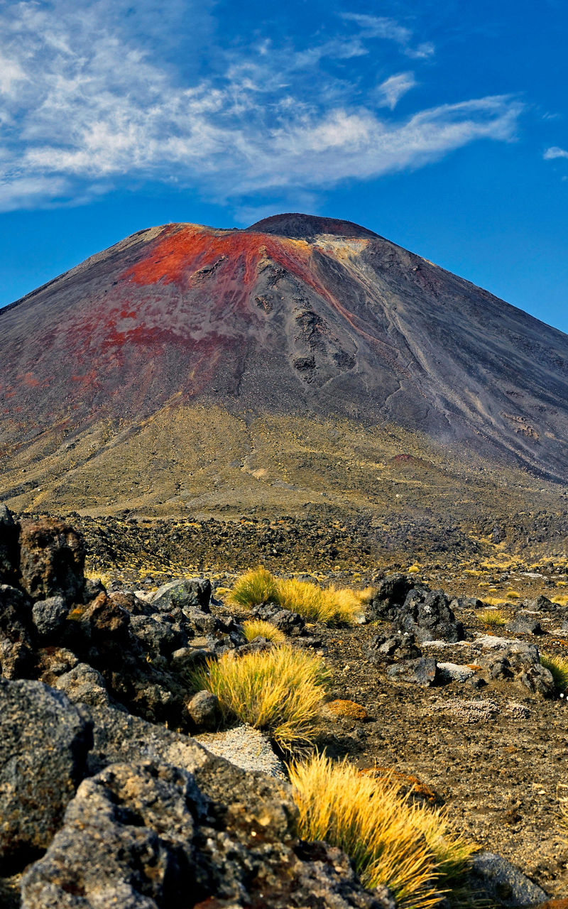 Majestic volcanic mountain under clear skies