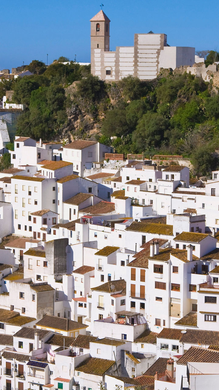 Whitewashed village with hilltop church