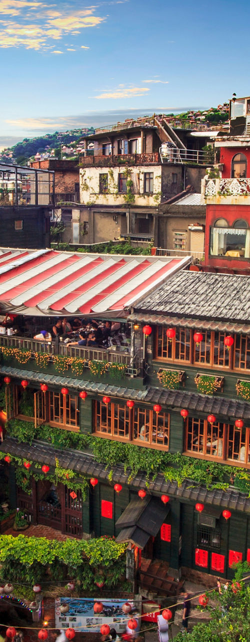 Colorful hillside tea house in scenic mountain village