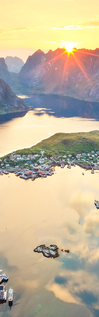 Scenic fjord view at sunset with mountains