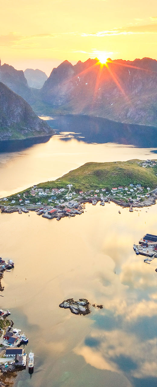 Scenic fjord view at sunset with mountains