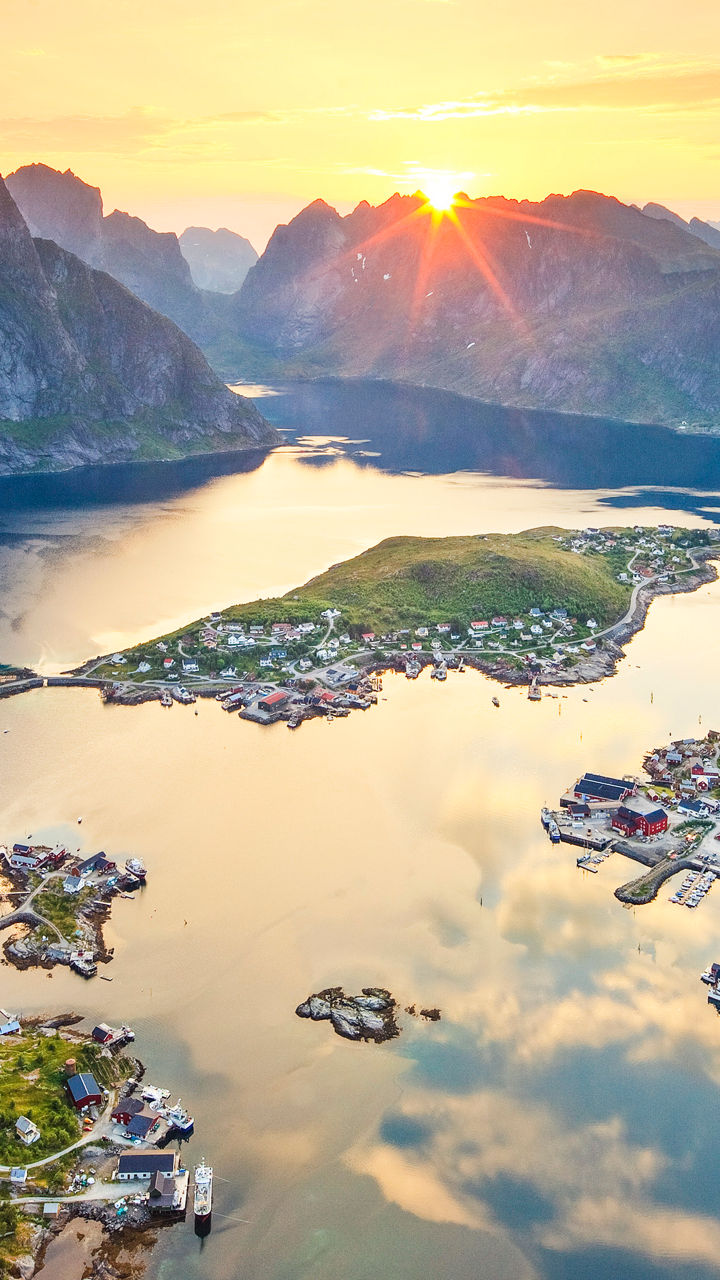Scenic fjord view at sunset with mountains