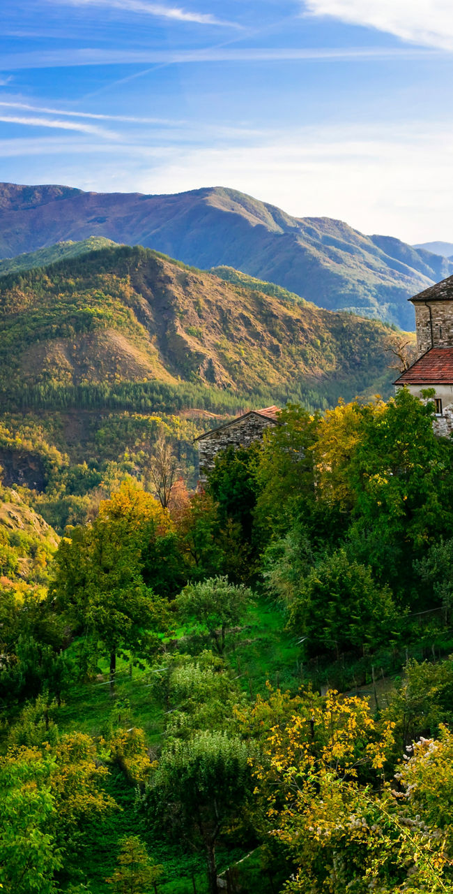 Scenic Italian village with mountain backdrop