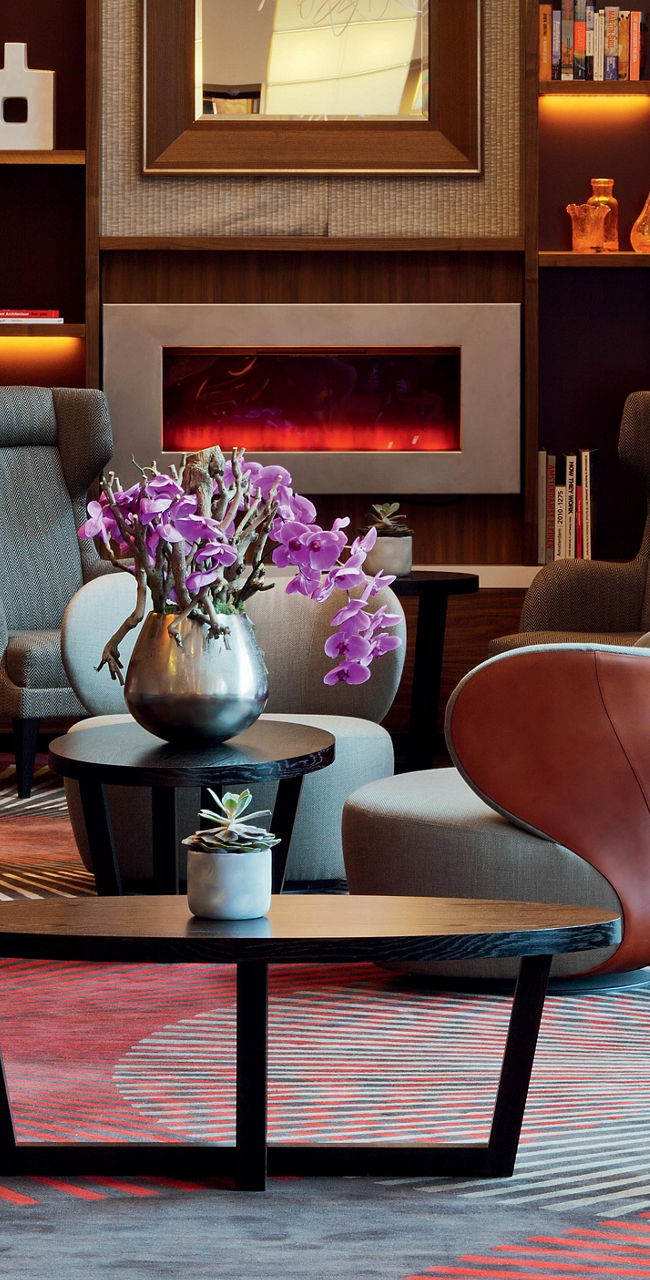 Modern lounge with vibrant decor and seating