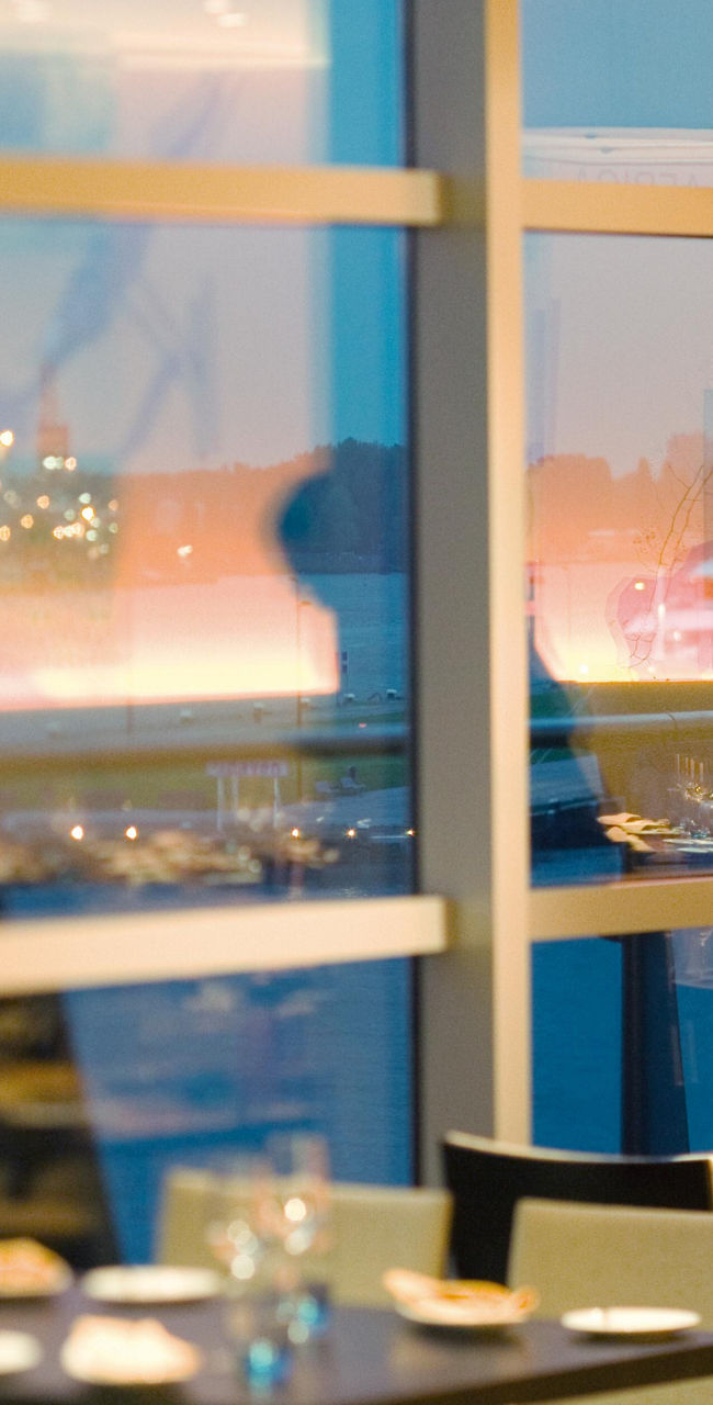 Elegant restaurant with cityscape view