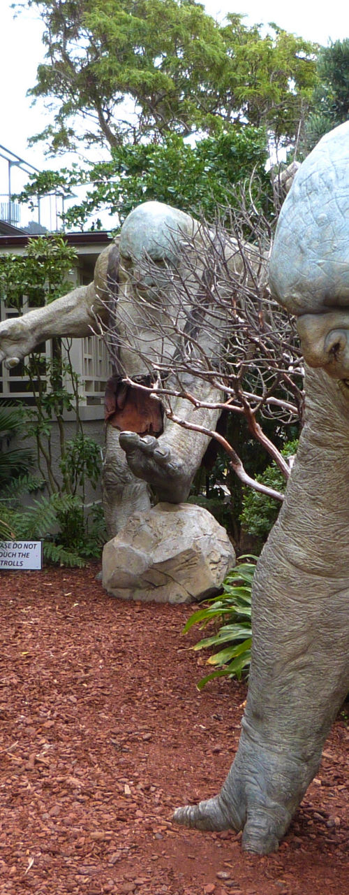 Large troll statues in suburban garden