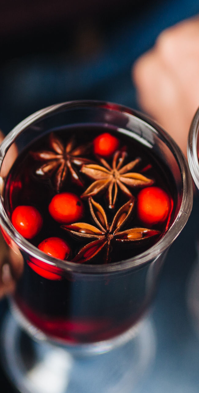 Two glasses of mulled wine with spices