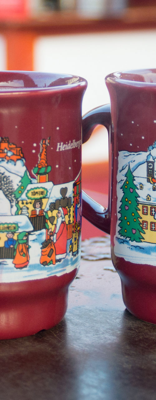 Festive mugs at Christmas market stall