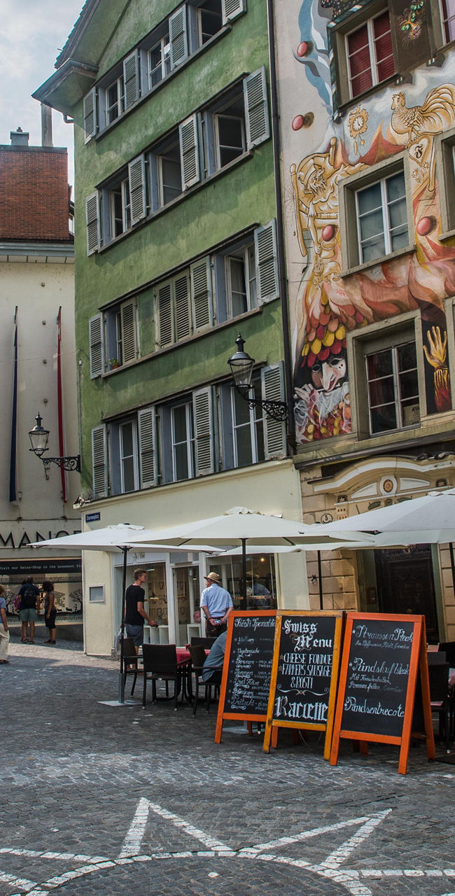 Colorful Swiss street with mural art