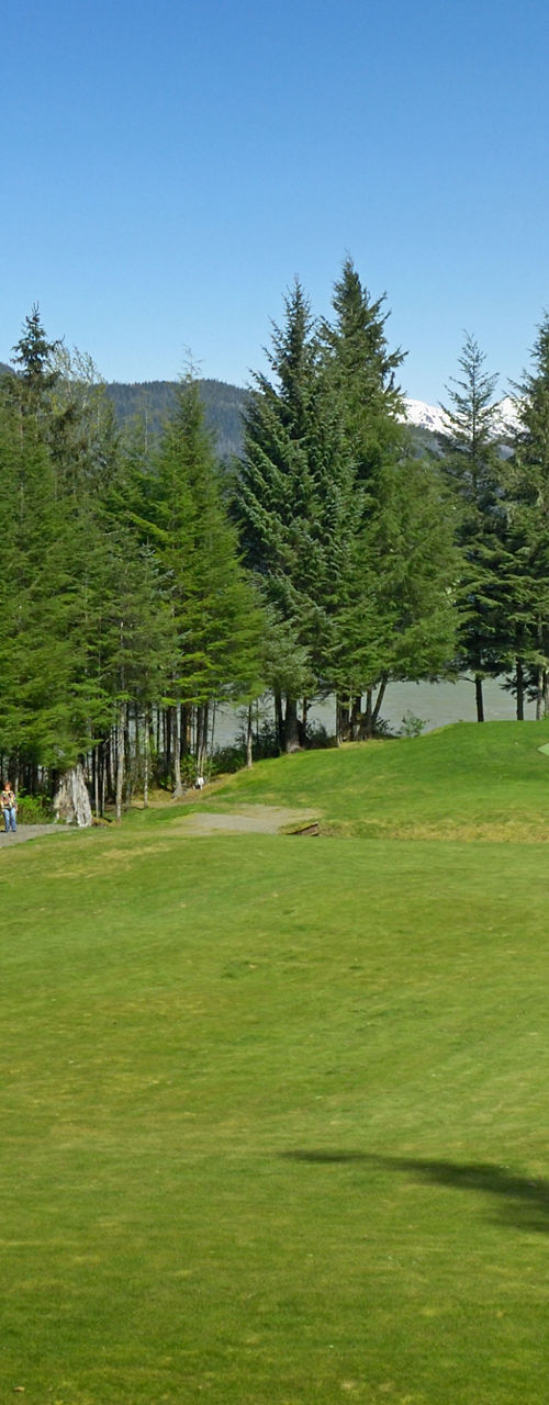 Scenic golf course with mountain backdrop