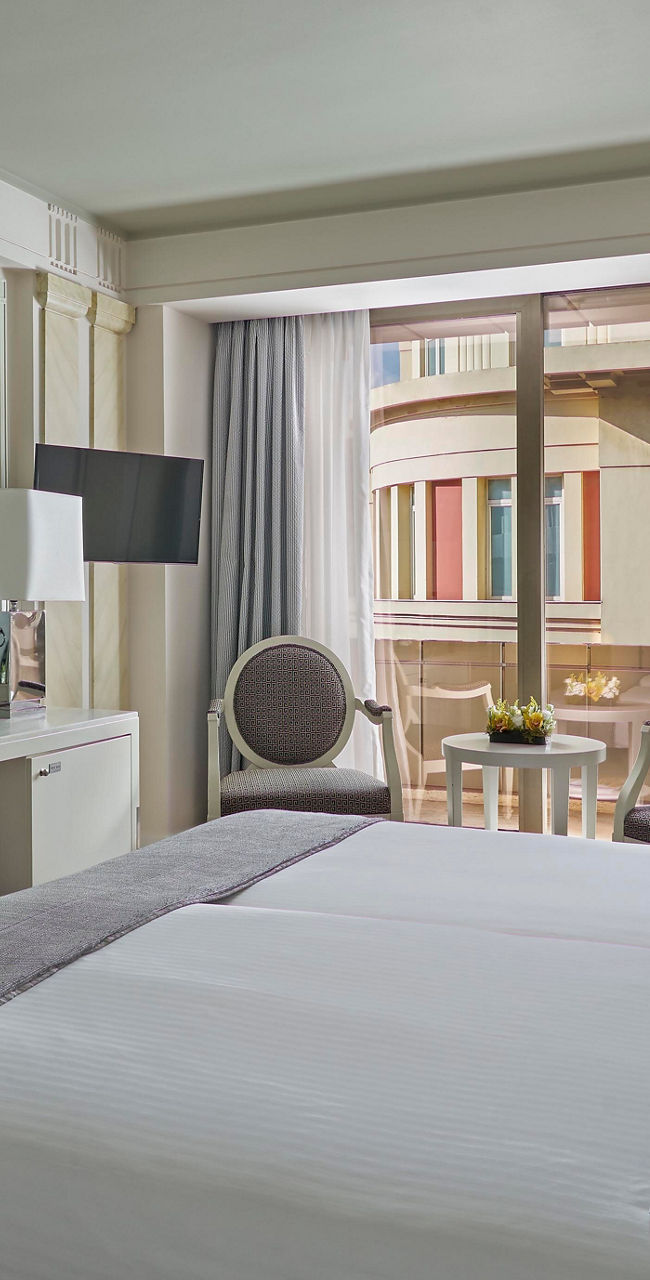 Modern hotel room with balcony view