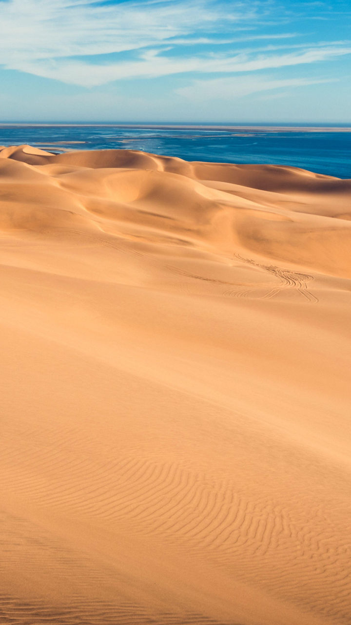 Golden sand dunes by the ocean