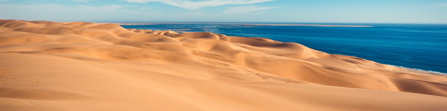 Golden sand dunes by the ocean