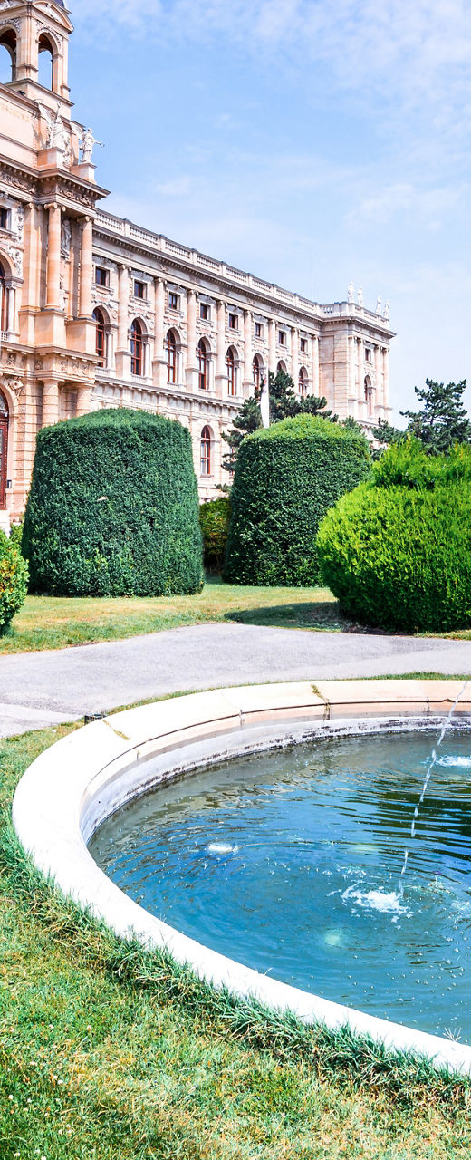 Historic building with ornate fountain