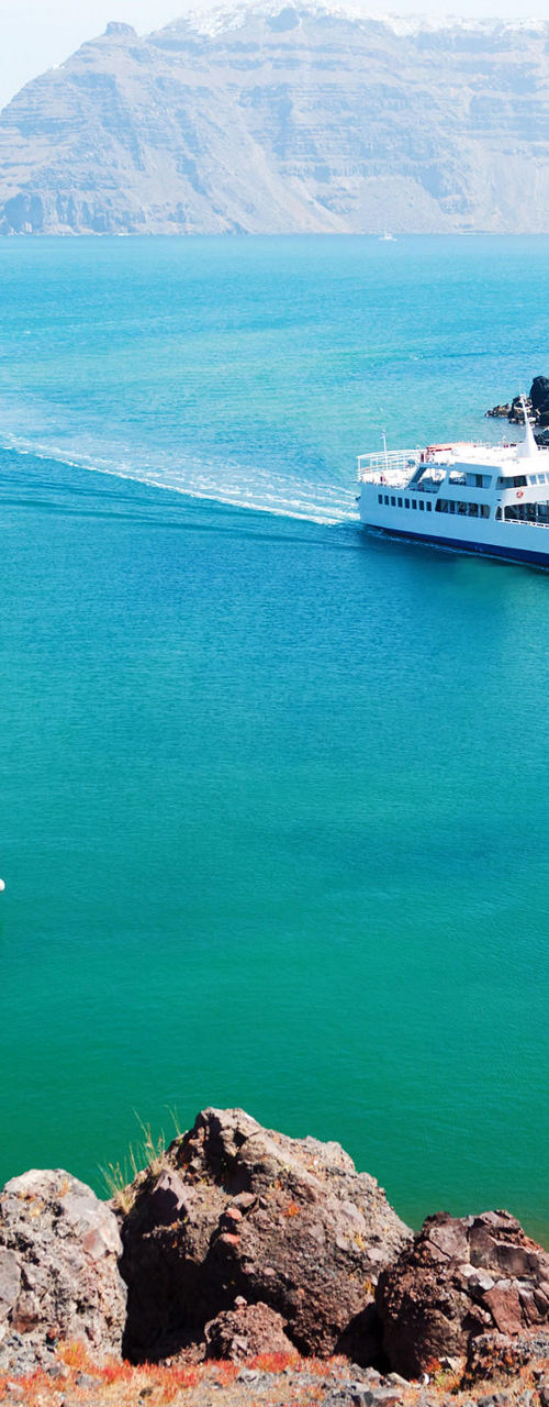 Boats in Scenic Volcanic Island Bay