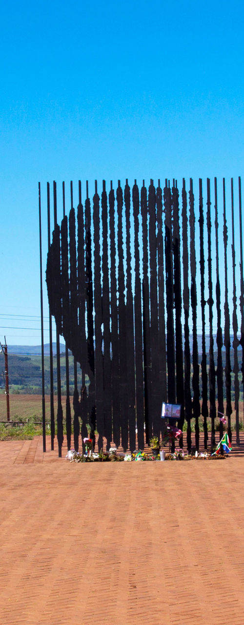 Nelson Mandela steel sculpture in open landscape