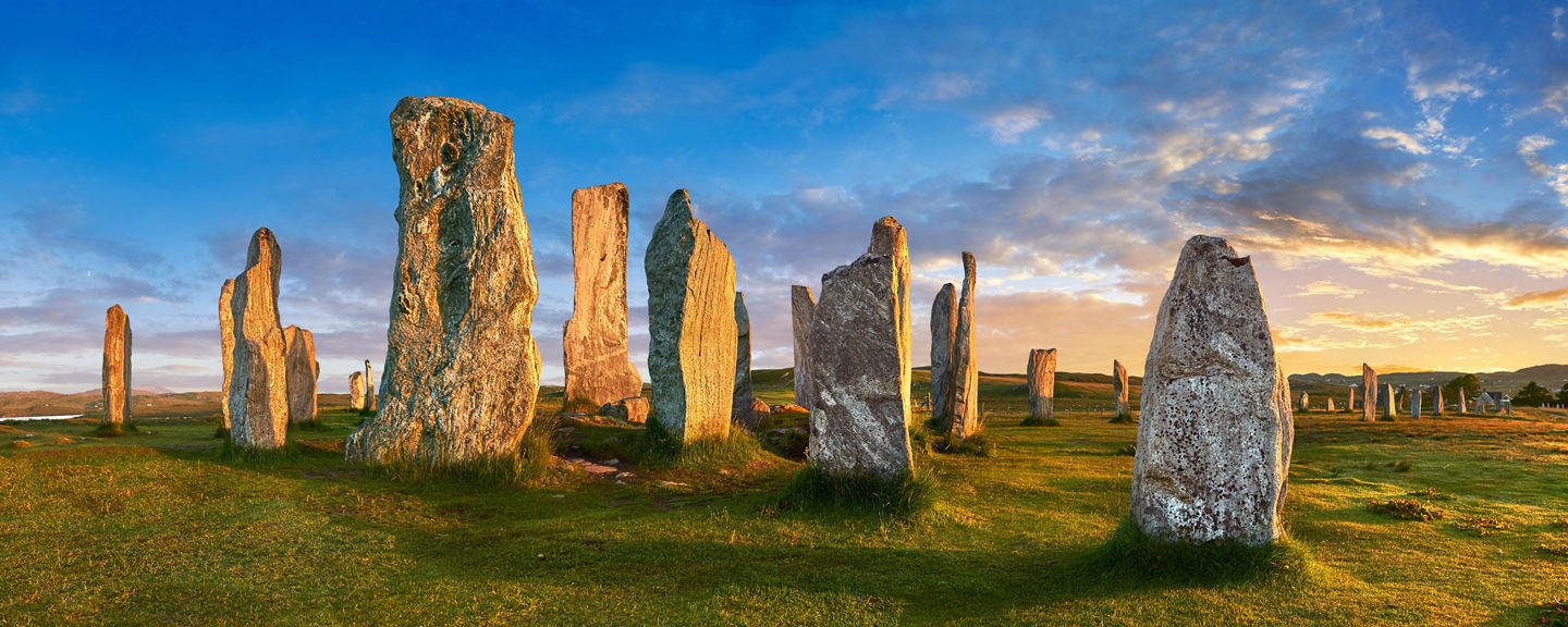 Ancient stone circle at sunset