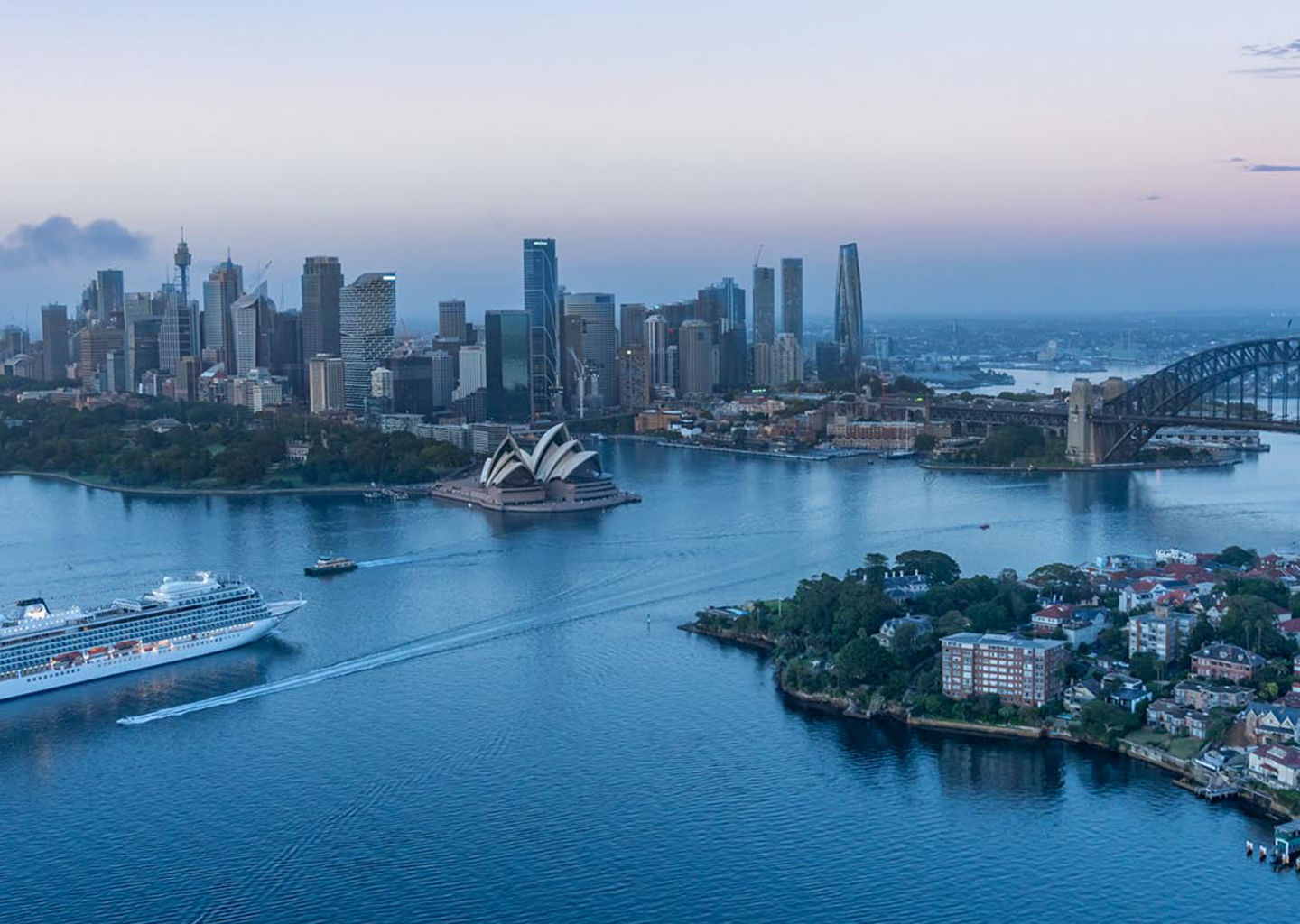 Cruise ship in Sydney Harbor at sunset