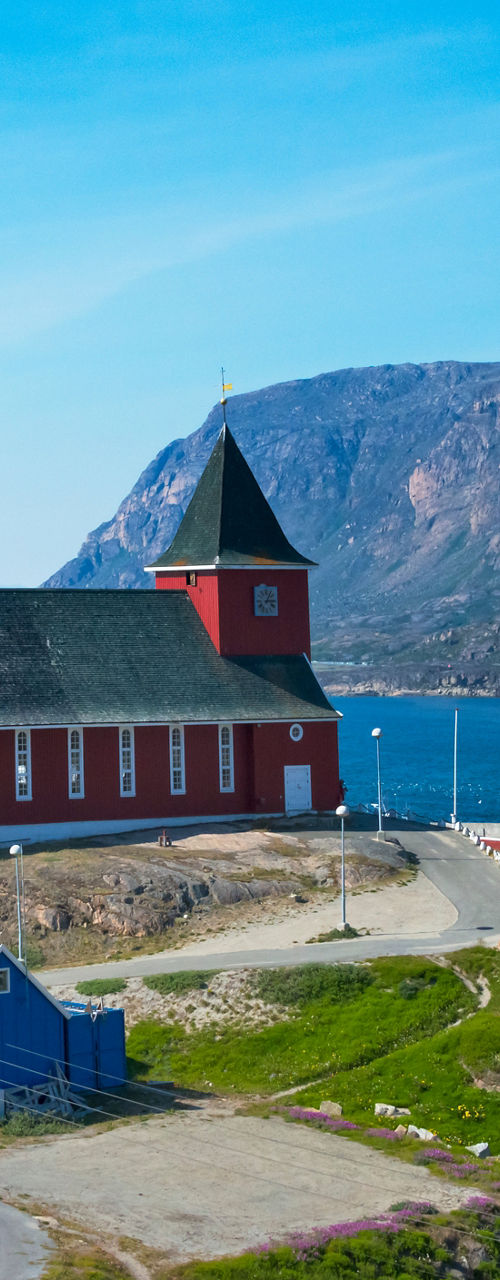 Scenic view of colorful houses and church