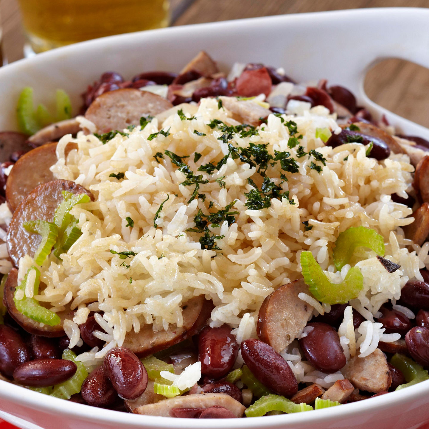 Rice and beans with sausage in bowl