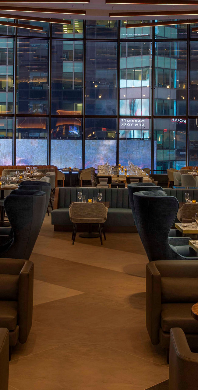 Modern restaurant interior with city view