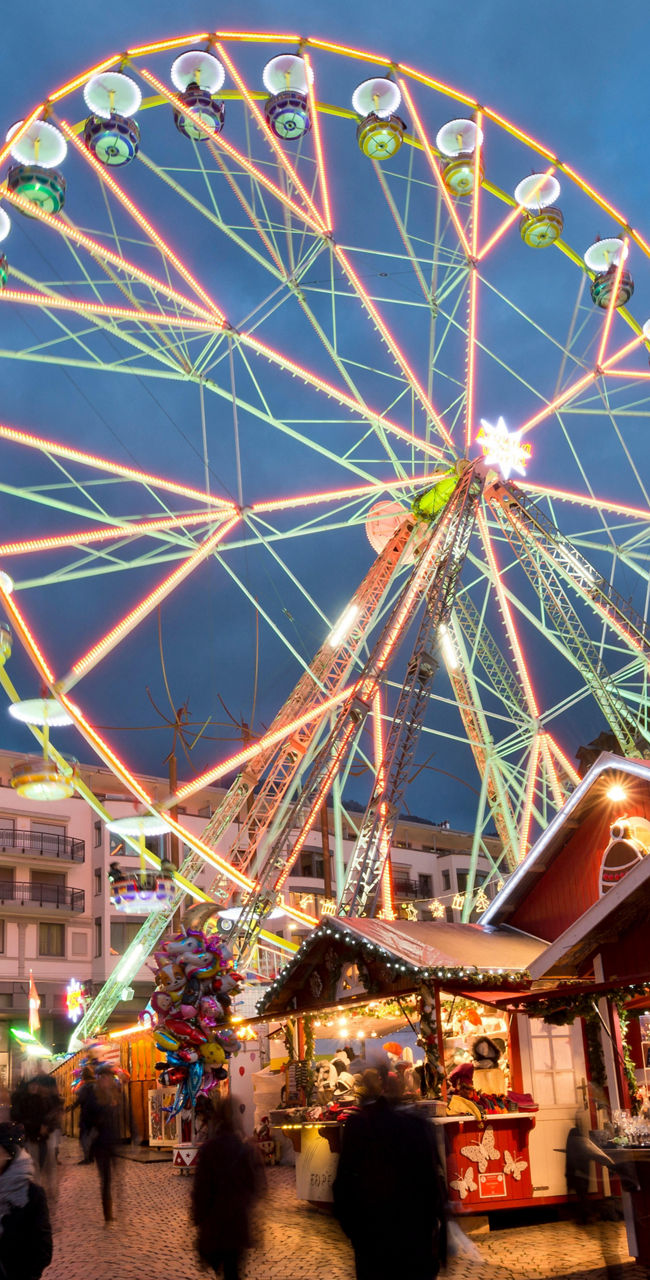 Festive Christmas market with ferris wheel
