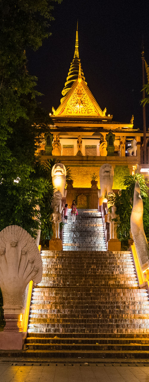 Illuminated temple stairs at night in Cambodia