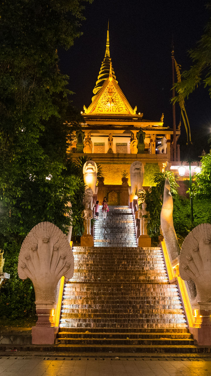 Illuminated temple stairs at night in Cambodia