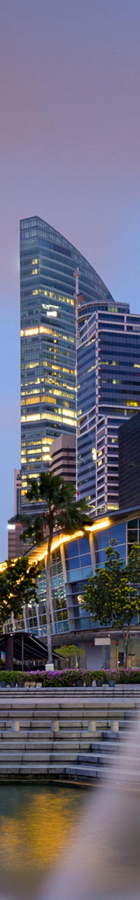 Singapore skyline with Merlion fountain at dusk