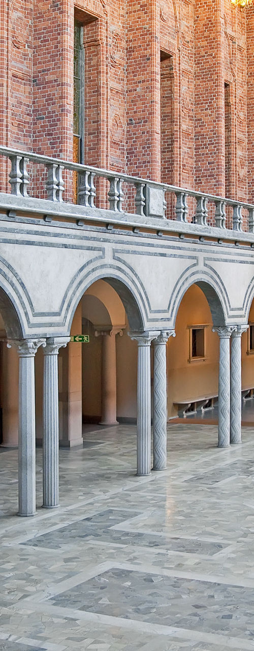 Elegant brick hall with arched columns