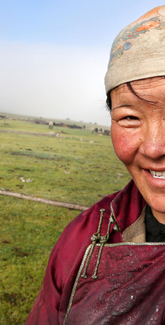Rural woman in traditional attire outdoors