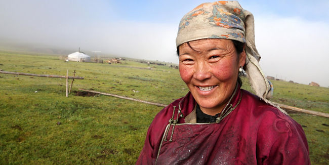 Rural woman in traditional attire outdoors