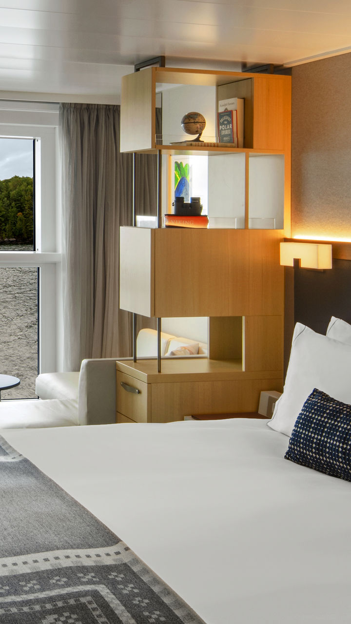 Modern cruise ship cabin with scenic view
