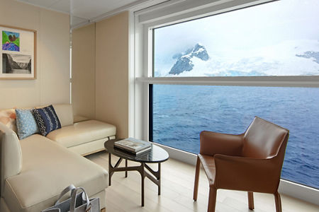 Modern lounge with ocean and glacier view