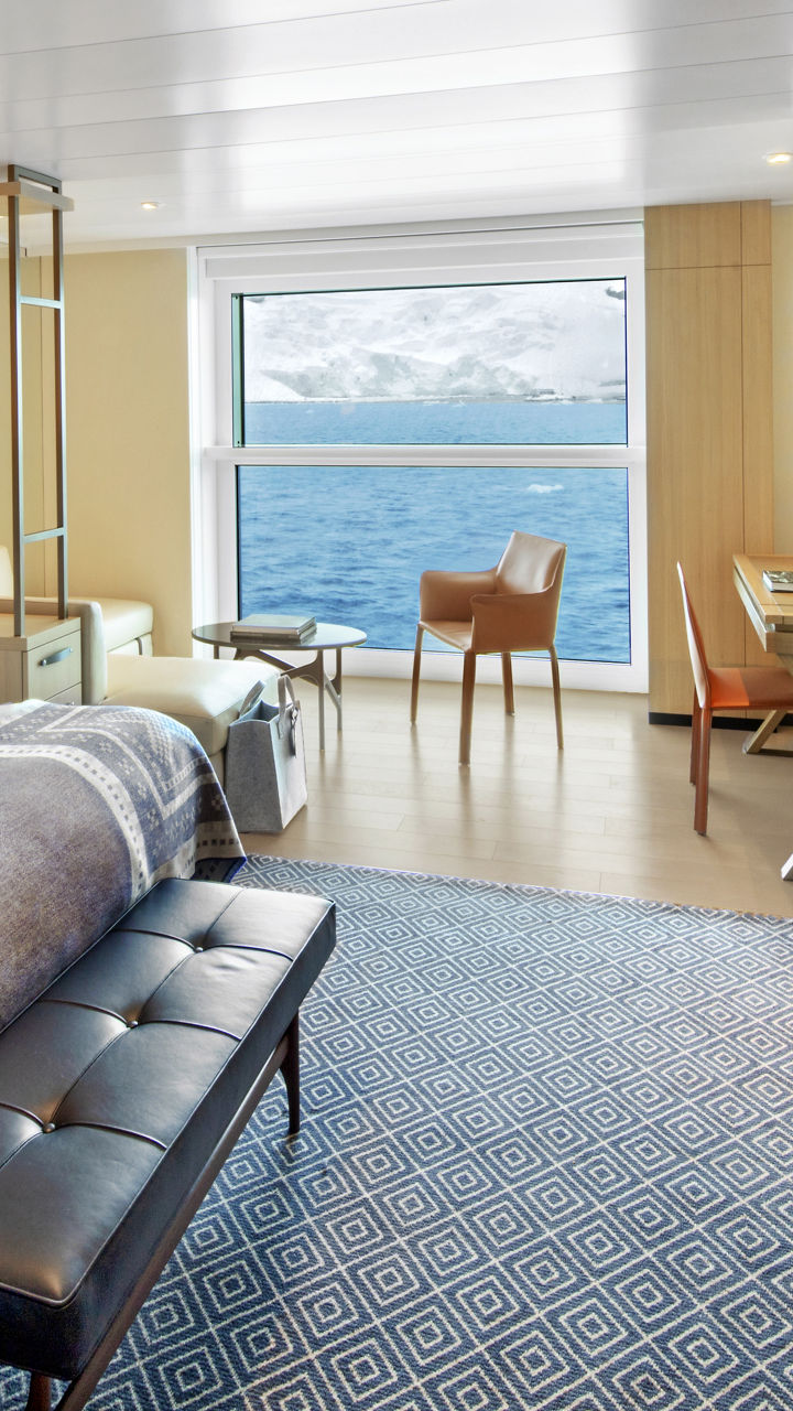 Modern cruise ship cabin with ocean view