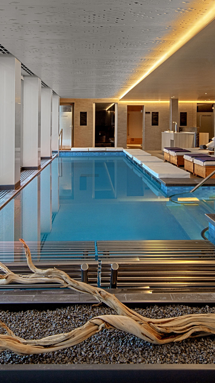 Luxury indoor pool with ocean view