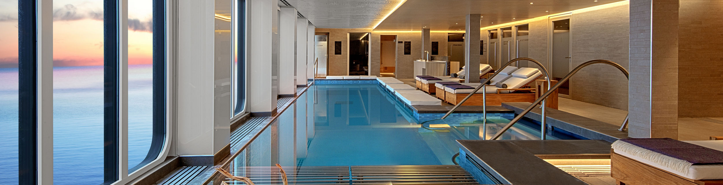 Luxury indoor pool with ocean view