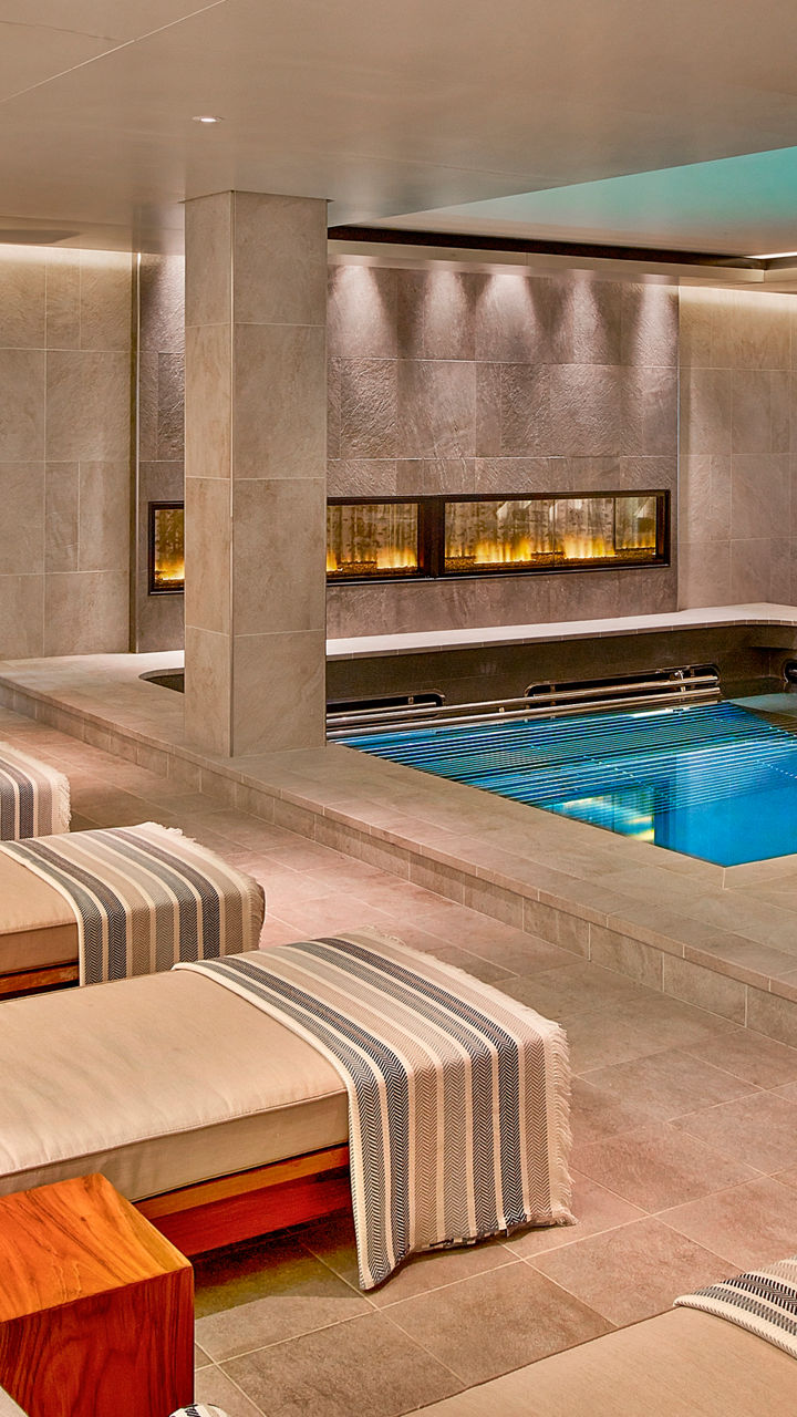 Luxury spa with indoor pools and loungers
