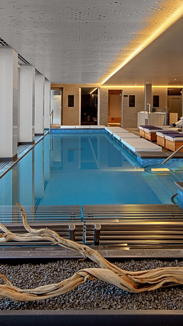 Luxury indoor pool with ocean view