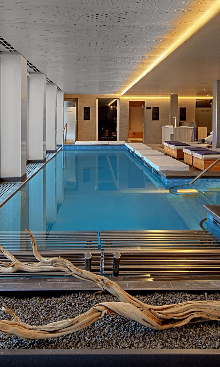 Luxury indoor pool with ocean view