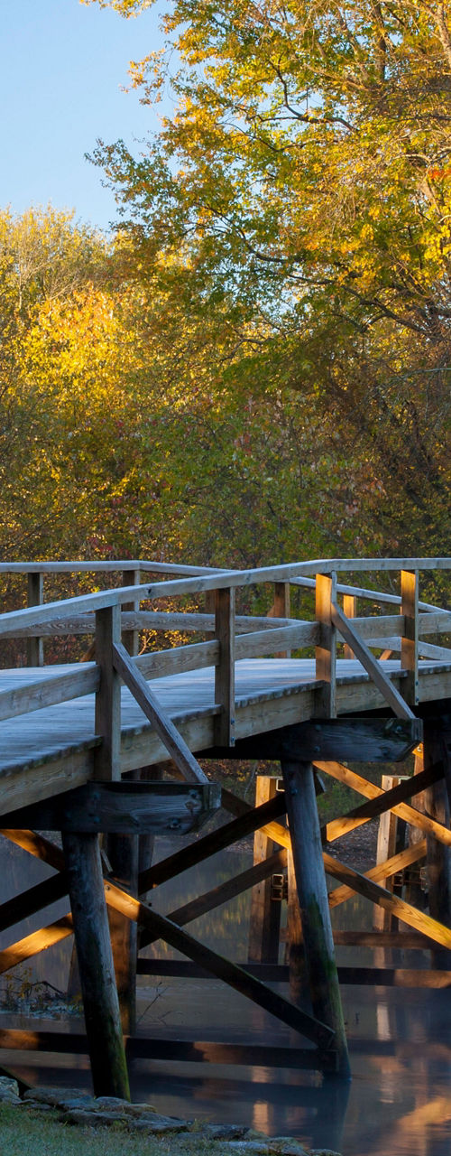 Historic wooden bridge in autumn scenery