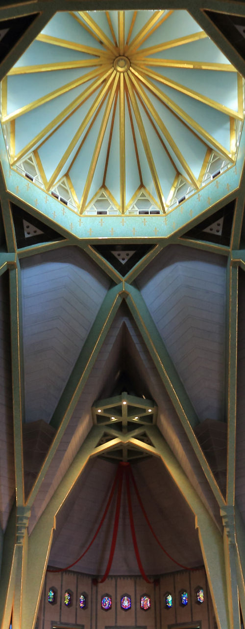 Interior of a grand cathedral with stained glass