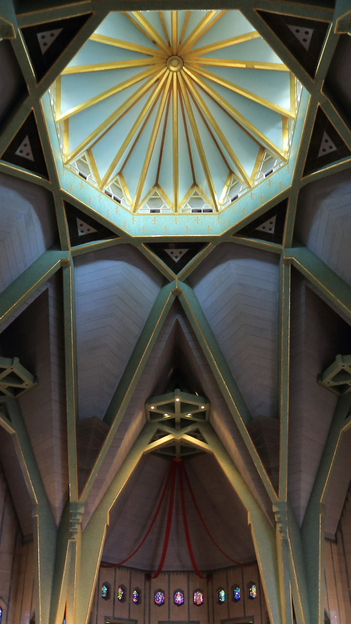 Interior of a grand cathedral with stained glass