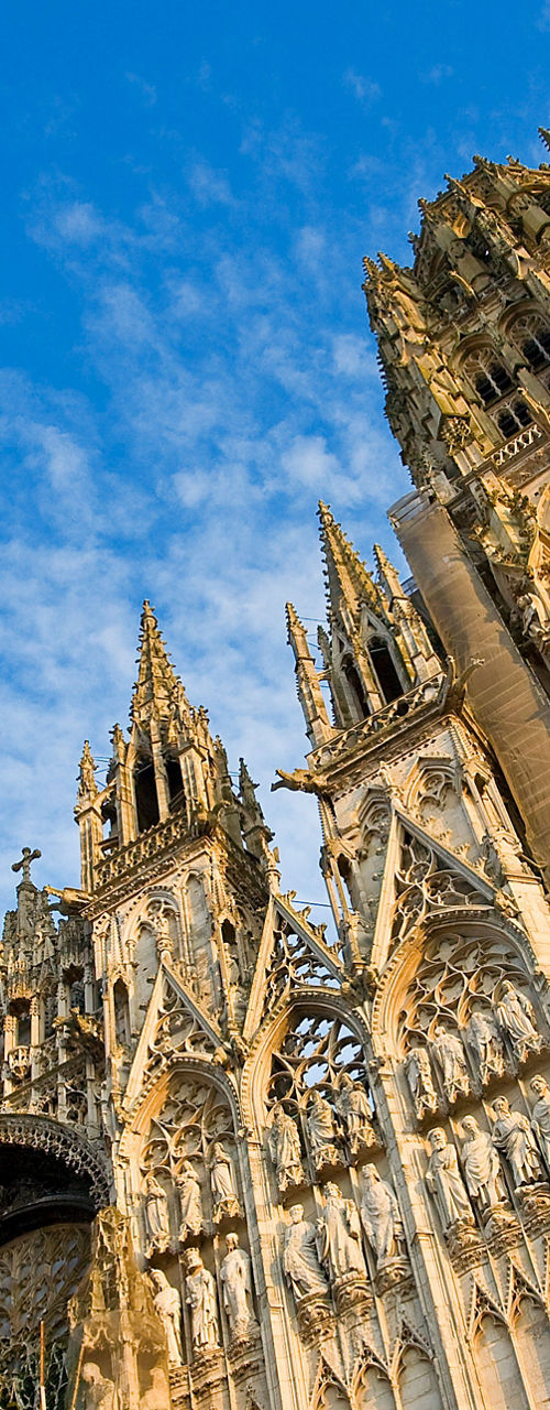 Gothic cathedral under vibrant blue sky