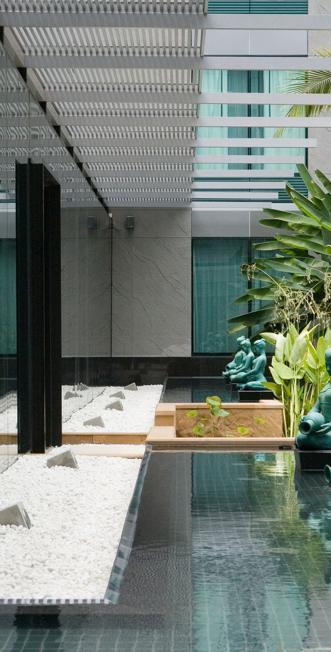 Modern courtyard with serene sculptures